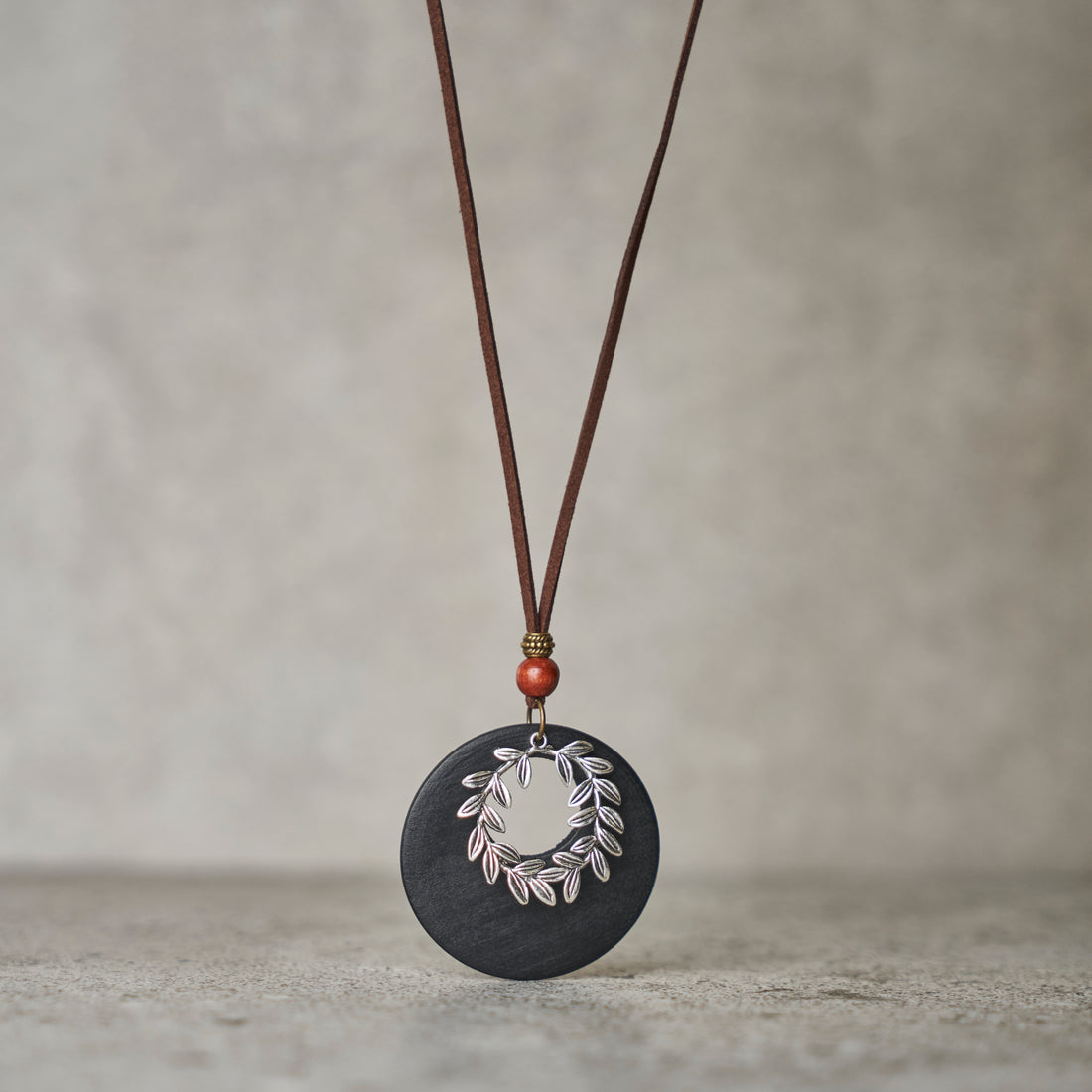 Kaklo papuošalas - Pasaulio ratas